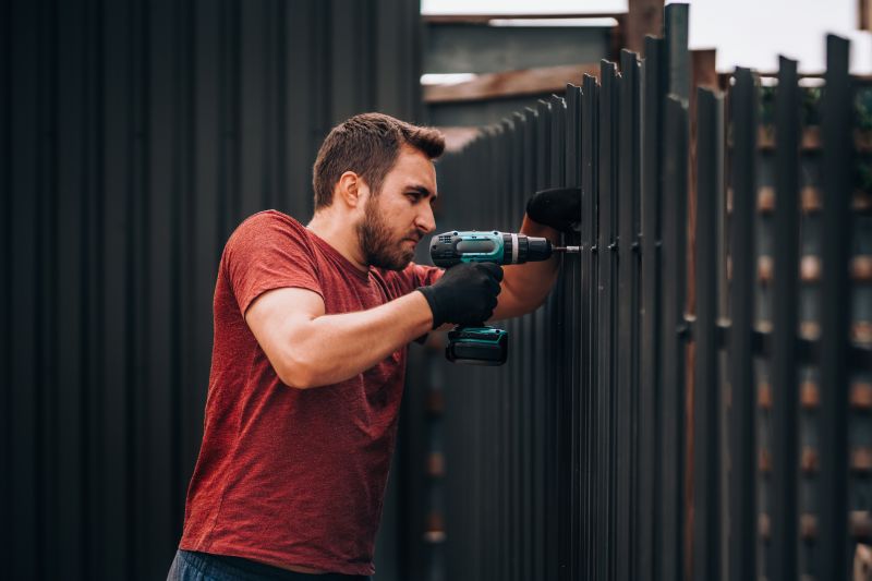 Black Metal Fence Installation in Des Moines, IA
